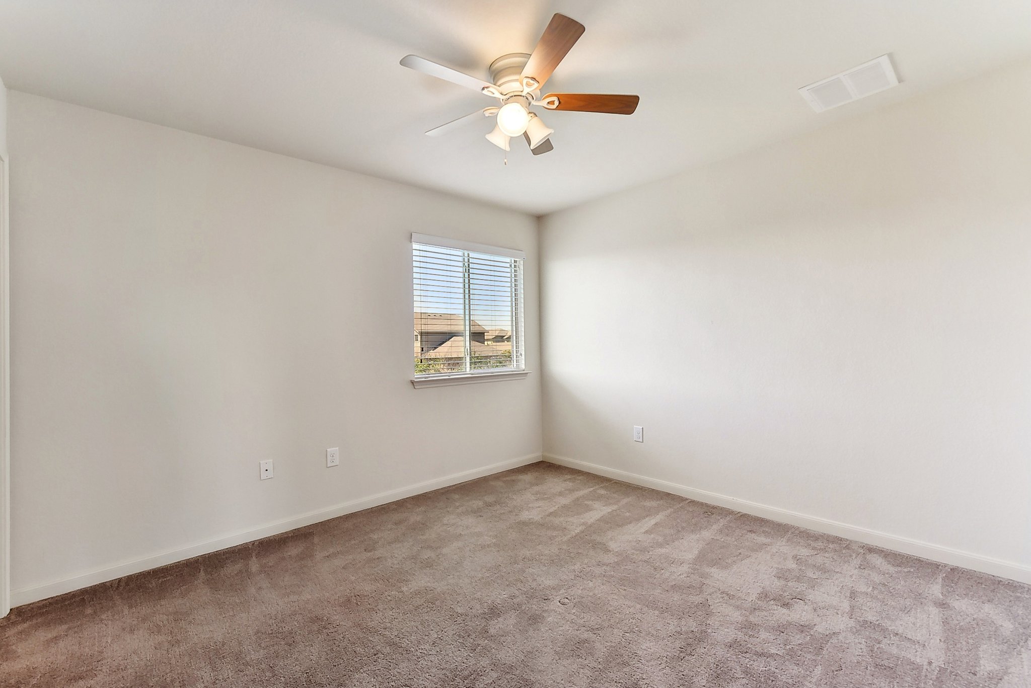 310 Potters Peak Way Georgetown, TX 78626 - Photo 13 of 21 Carpeted room with a ceiling fan, white walls, and a window featuring horizontal blinds