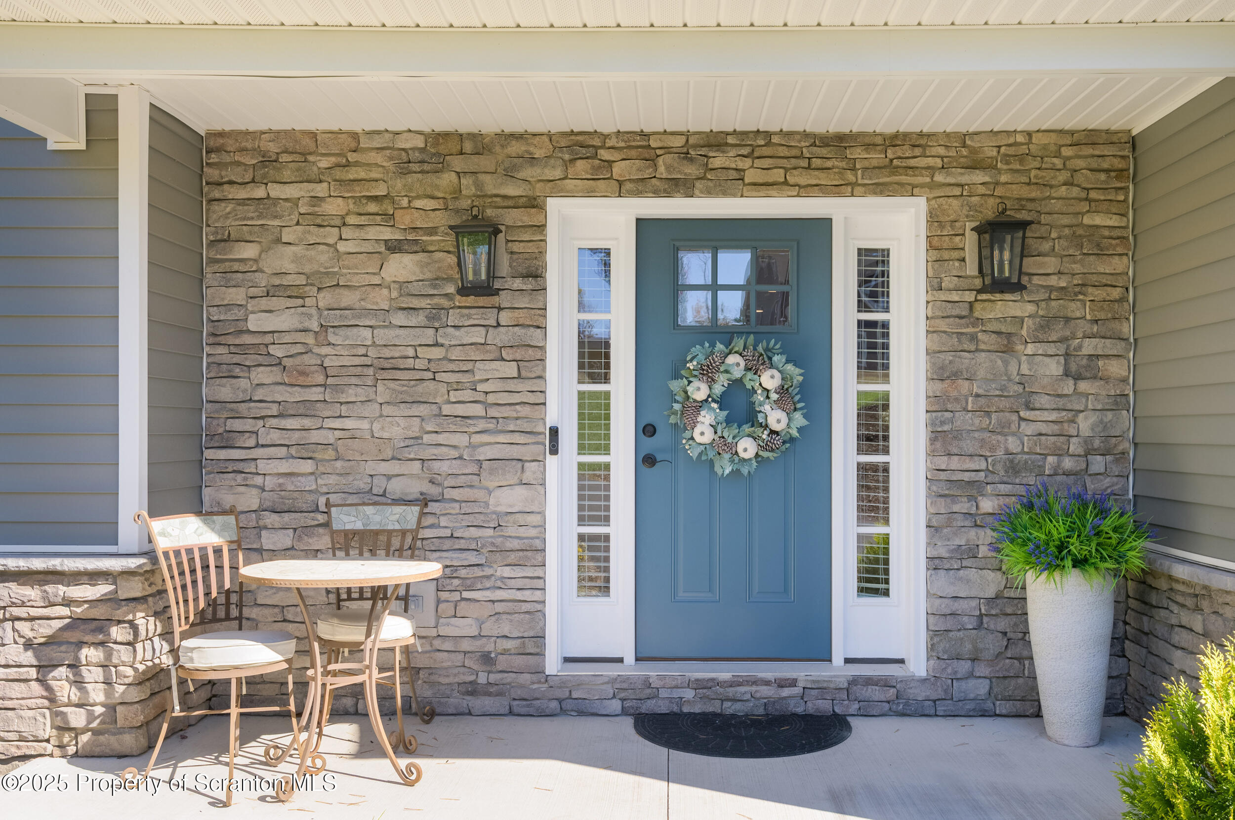 131 Chinaberry Way Kunkletown, PA 18058 - Photo 11 of 48 a front view of a house with a chairs