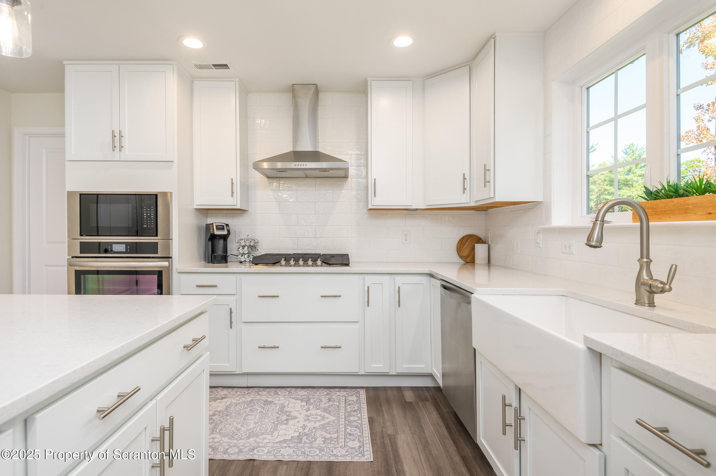 131 Chinaberry Way Kunkletown, PA 18058 - Photo 18 of 48 a kitchen with cabinets appliances and a window