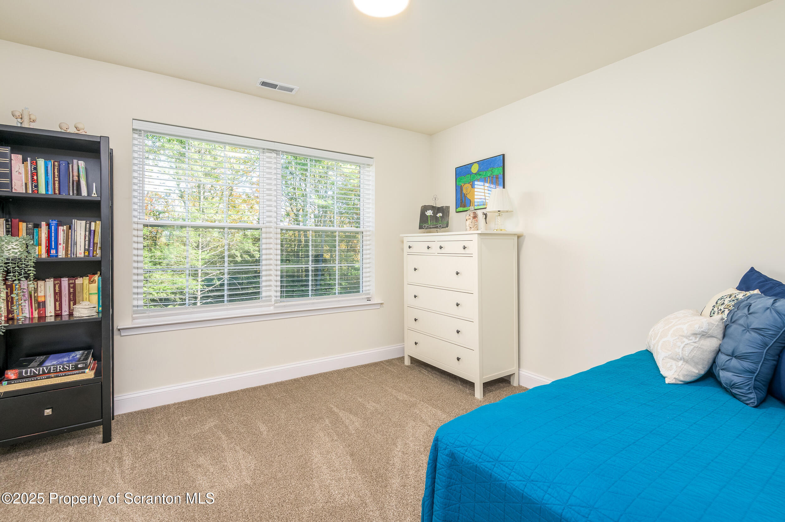 131 Chinaberry Way Kunkletown, PA 18058 - Photo 30 of 48 a bedroom with a bed and a window