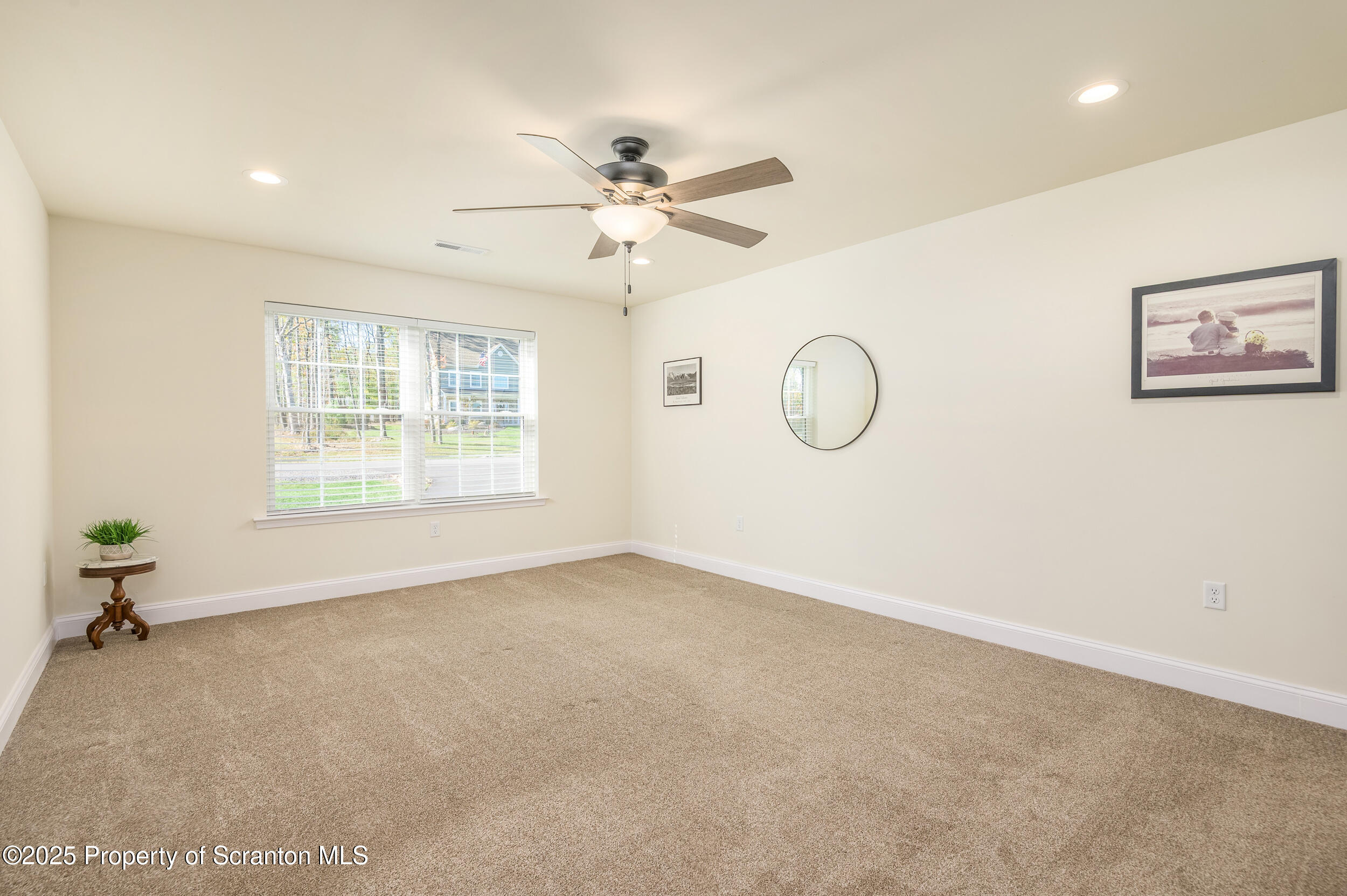 131 Chinaberry Way Kunkletown, PA 18058 - Photo 32 of 48 an empty room with windows and fan
