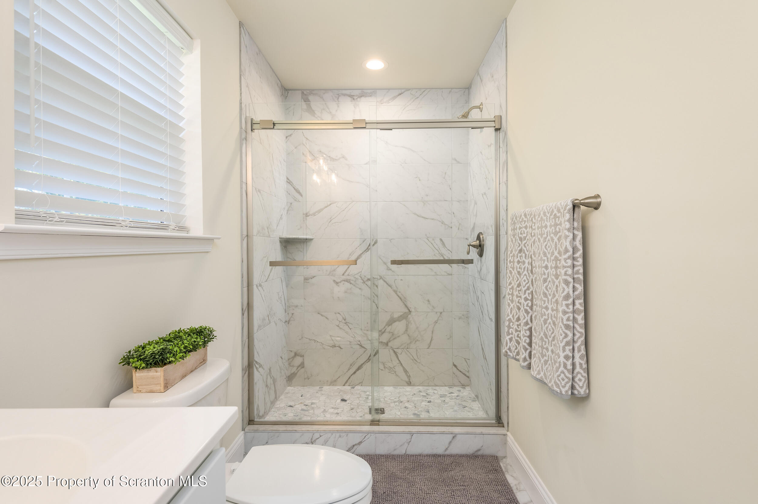 131 Chinaberry Way Kunkletown, PA 18058 - Photo 35 of 48 a bathroom with a shower curtain and a bathtub