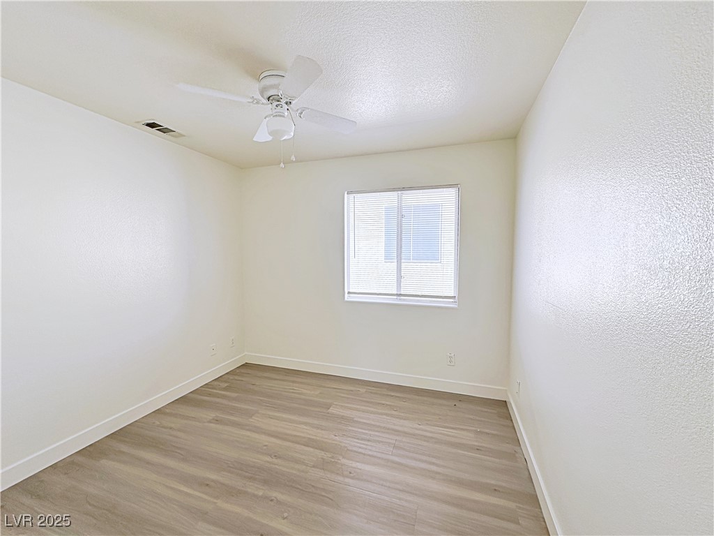 9416 Moon Splash Court Las Vegas, NV 89129 - Photo 31 of 47 Upstairs secondary bedroom 3