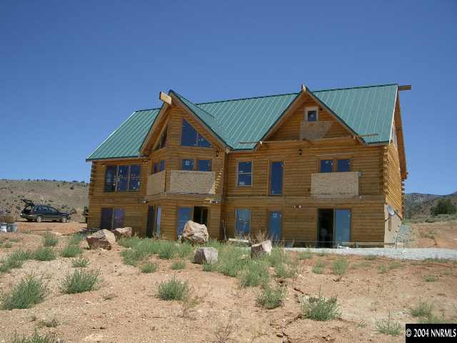 1755 Piute Creek Road Reno, NV 89510 - Photo 1 of 5 a front view of a house with a yard