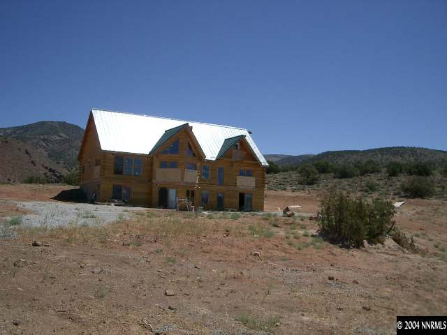 1755 Piute Creek Road Reno, NV 89510 - Photo 5 of 5 a view of a house with a yard