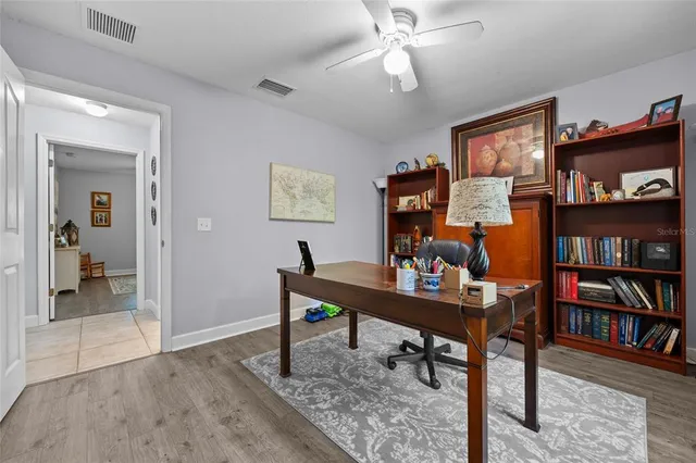 a view of a workspace with furniture