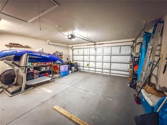 a view of a garage with storage