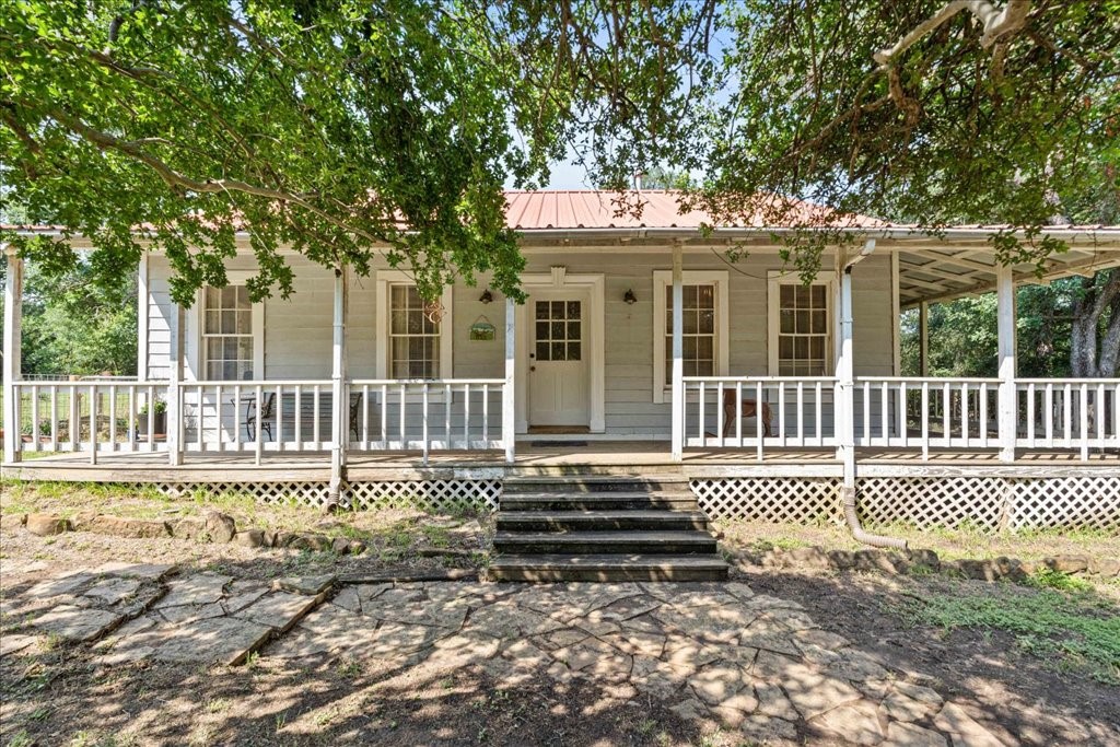 371 Youngs Prairie Road Elgin, TX 78621 - Photo 1 of 1 front view of a house with a large window