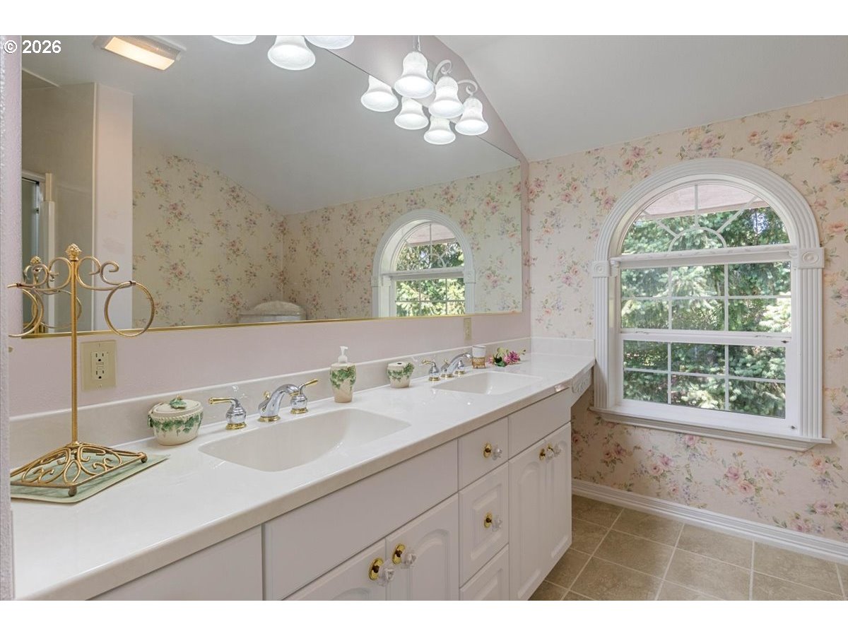 1300 Fair Oaks Road Oakland, OR 97462 - Photo 36 of 48 a bathroom with a sink mirror and window