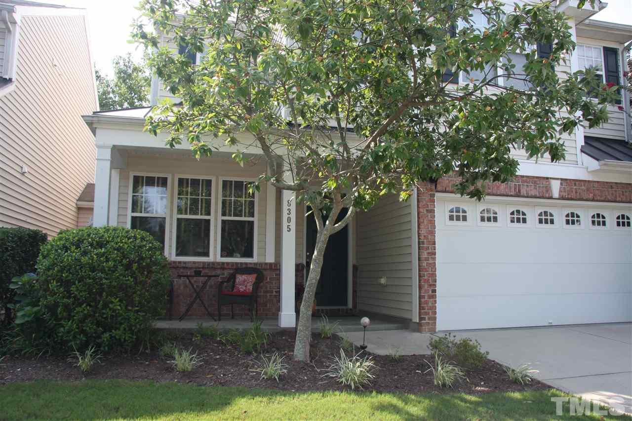 8305 Rubblestone Path Raleigh, NC 27613 - Photo 2 of 24 a front view of a house with garden