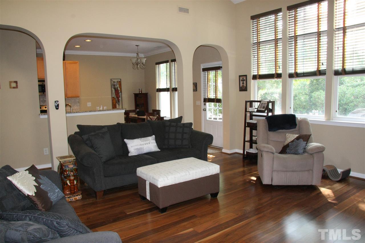 8305 Rubblestone Path Raleigh, NC 27613 - Photo 11 of 24 a living room with furniture and a large window