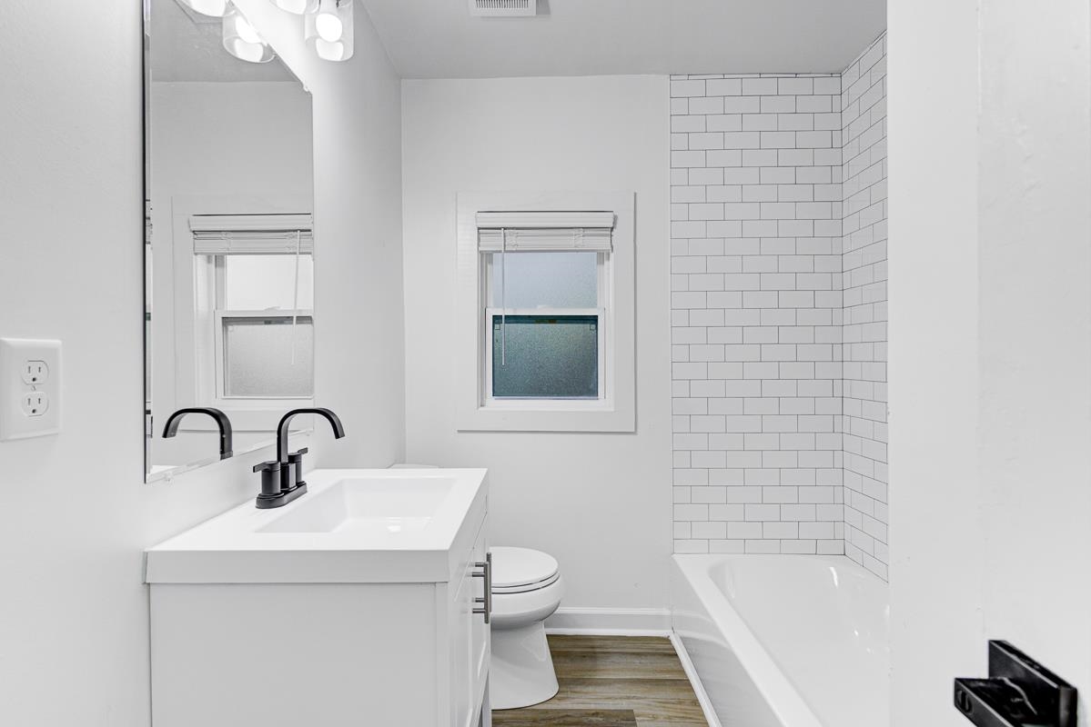 3512 Wilshire Road Memphis, TN 38111 - Photo 9 of 19 a bathroom with a sink toilet and shower