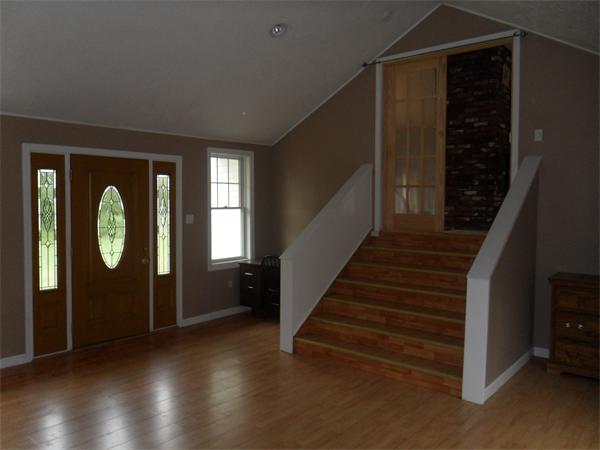 706 Main Street Boxford, MA 01921 - Photo 14 of 26 a view of a hallway with wooden floor