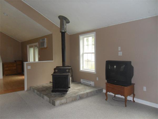 706 Main Street Boxford, MA 01921 - Photo 15 of 26 a living room with furniture and a window
