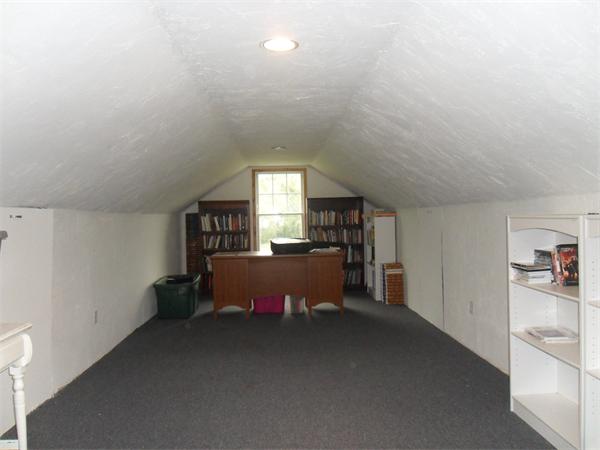 706 Main Street Boxford, MA 01921 - Photo 18 of 26 a bed room with a bed and a window