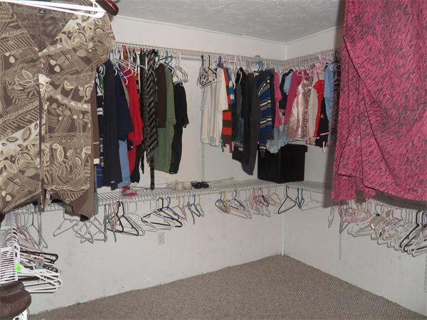 706 Main Street Boxford, MA 01921 - Photo 21 of 26 a view of walk in closet with clothes