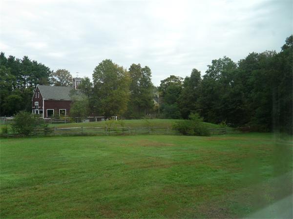 706 Main Street Boxford, MA 01921 - Photo 26 of 26 a backyard of a house with lots of green space