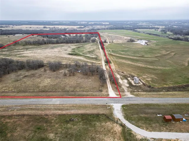 a view of an outdoor space and tennis court