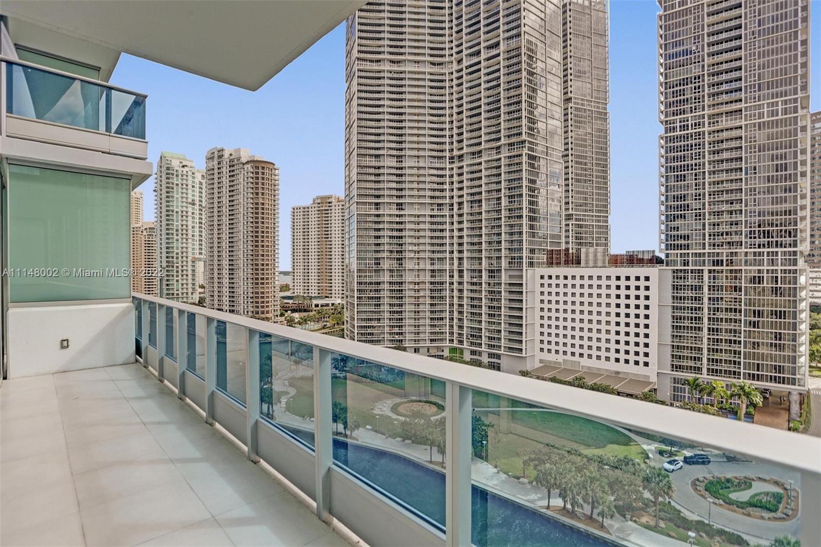 200 Biscayne Blvd Way, Unit 1403 Miami, FL 33131 - Photo 17 of 67 a view of balcony with wooden floor