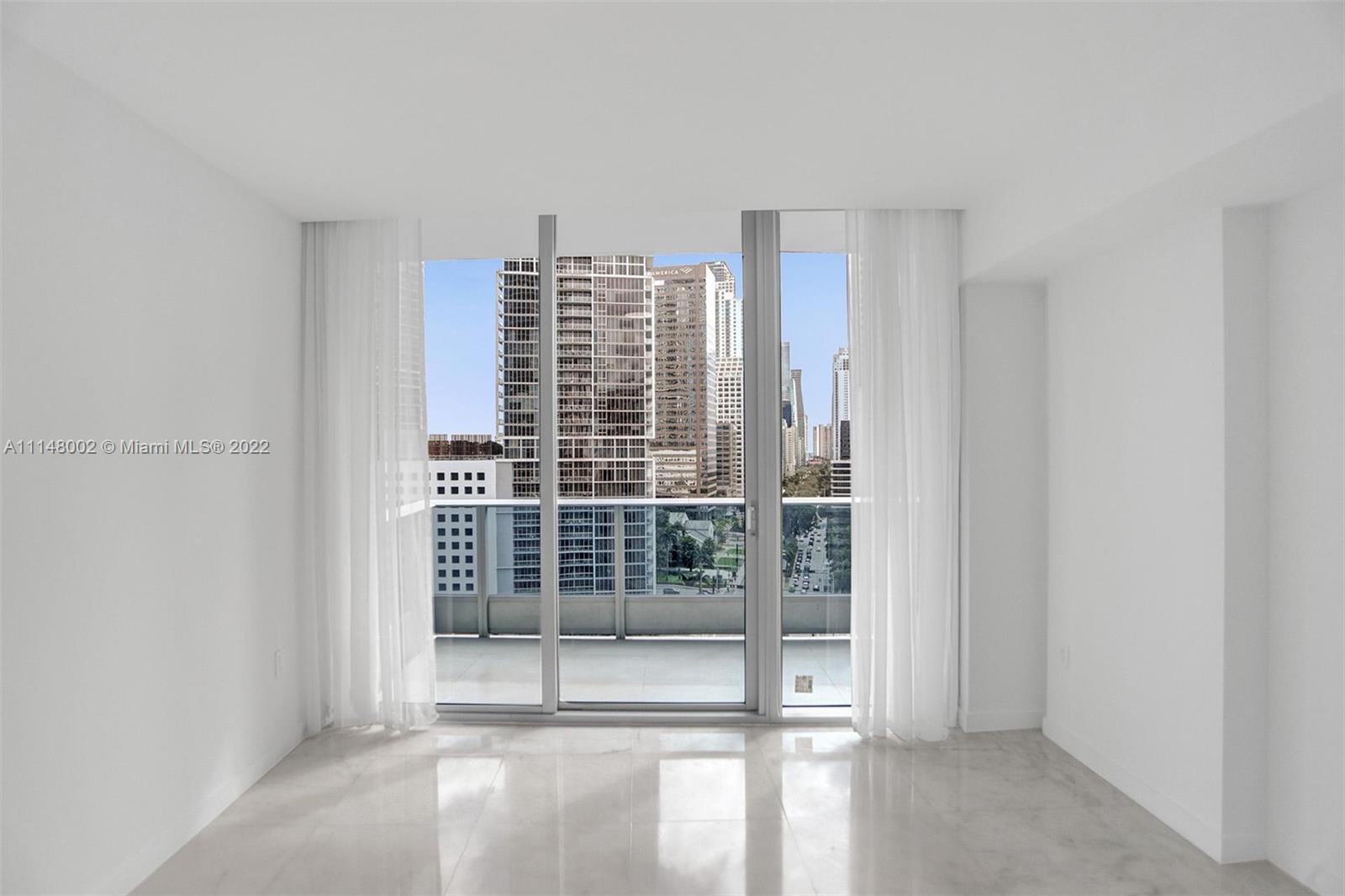 200 Biscayne Blvd Way, Unit 1403 Miami, FL 33131 - Photo 41 of 67 a view of an empty room with a window