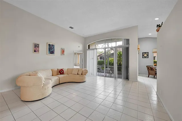 a bed room with a bed and a window