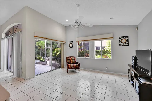 a bedroom with bed and window