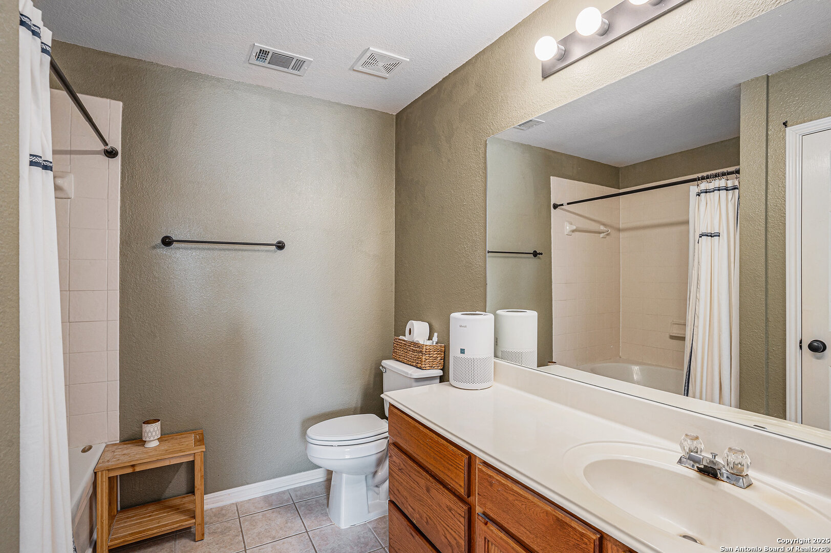 117 Hidden Fawn Cibolo, TX 78108 - Photo 18 of 25 a bathroom with a sink toilet and shower
