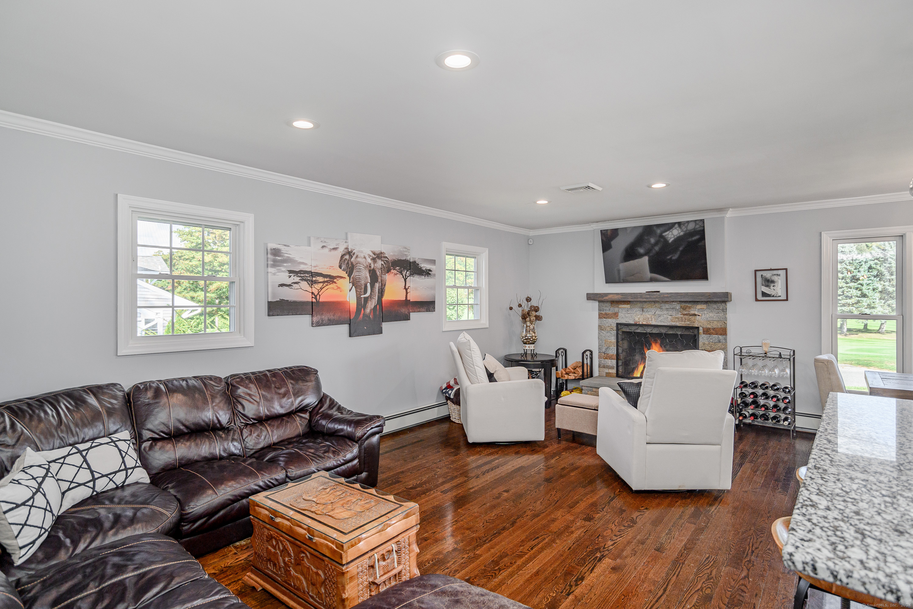 22 Brookside Trail New Milford, CT 06776 - Photo 13 of 40 a living room with fireplace furniture and a window