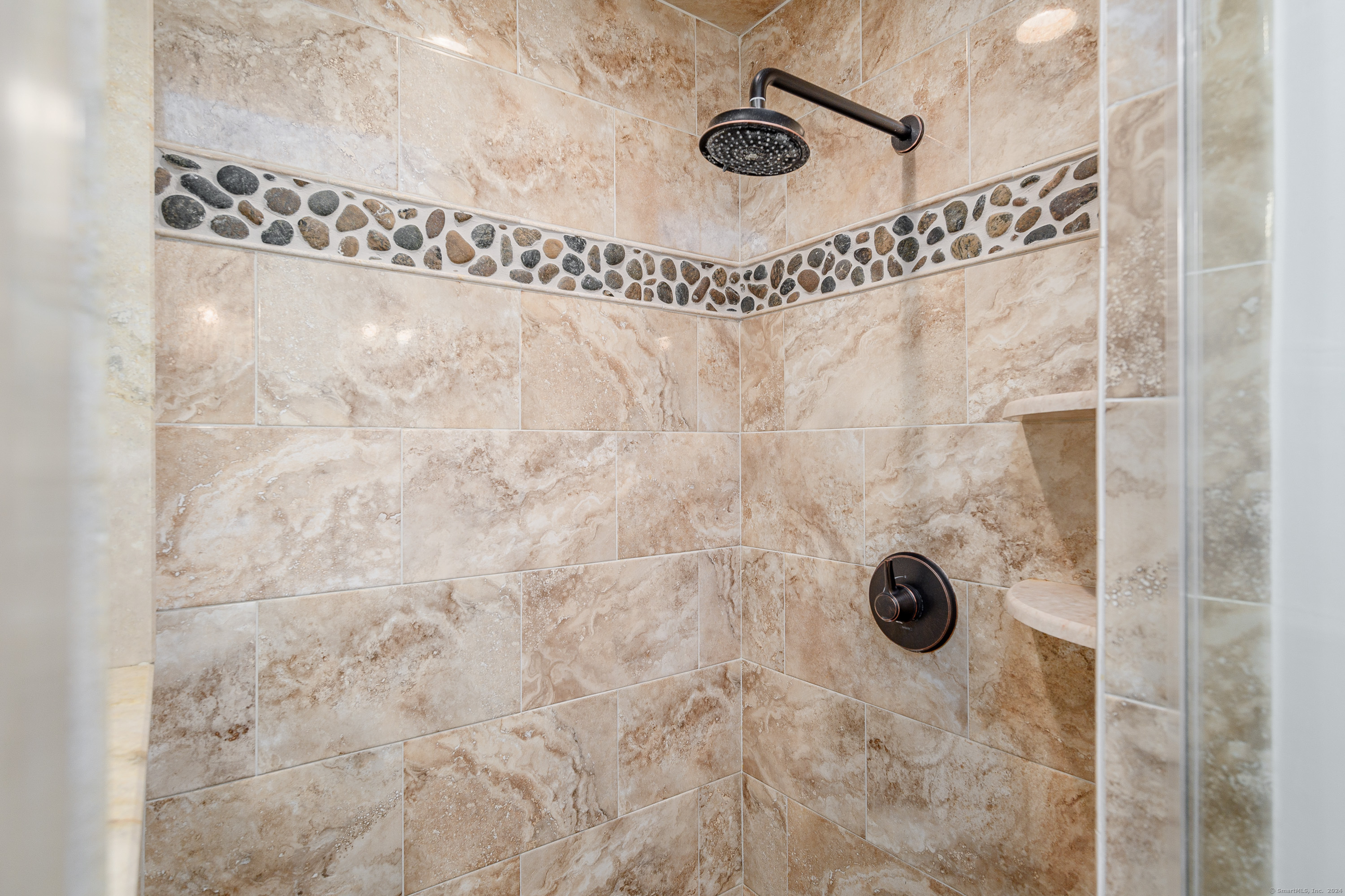 22 Brookside Trail New Milford, CT 06776 - Photo 22 of 40 a bathroom with a shower