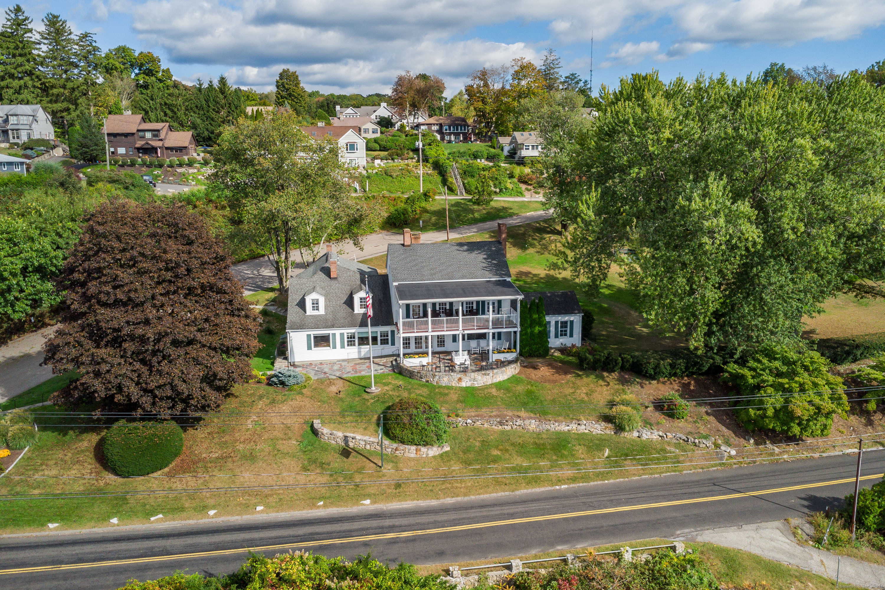 22 Brookside Trail New Milford, CT 06776 - Photo 27 of 40 a view of a house with a swimming pool