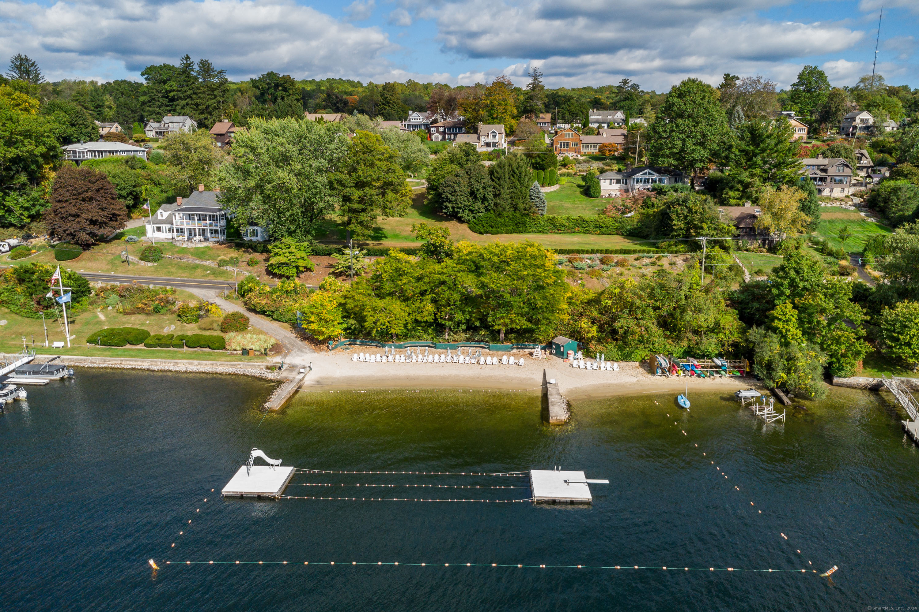 22 Brookside Trail New Milford, CT 06776 - Photo 32 of 40 a view of a lake with a yard