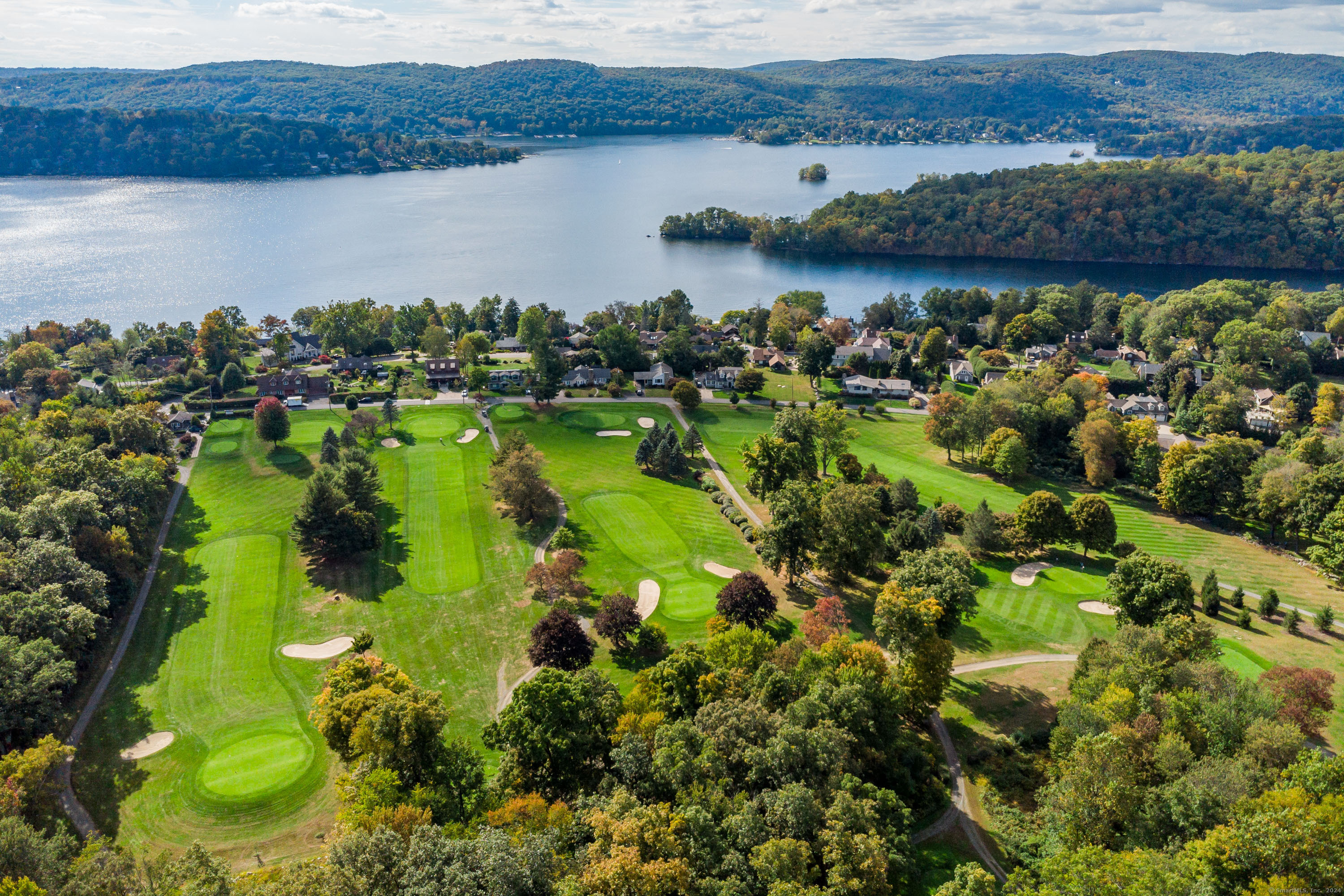 22 Brookside Trail New Milford, CT 06776 - Photo 34 of 40 a view of a lake with a mountain