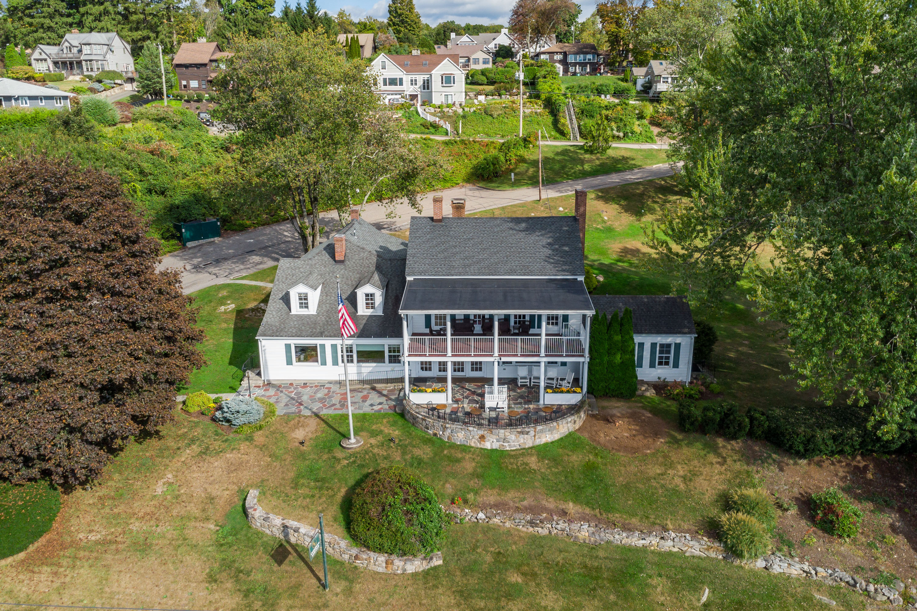 22 Brookside Trail New Milford, CT 06776 - Photo 38 of 40 an aerial view of a house with swimming pool and garden