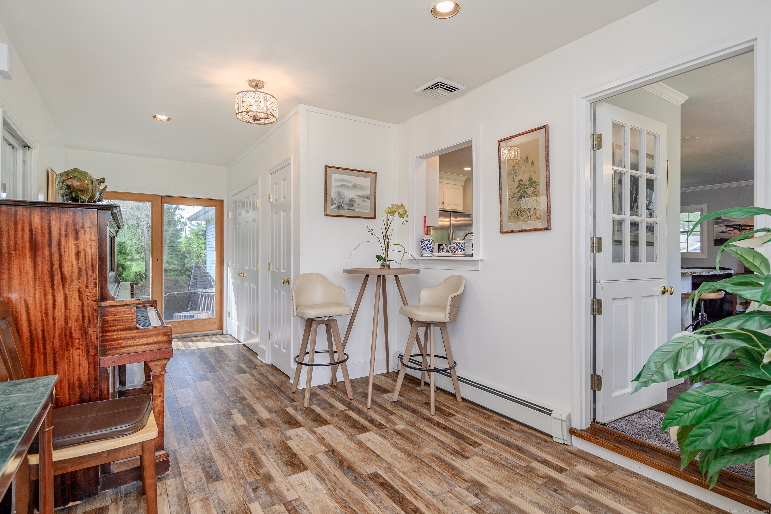 22 Brookside Trail New Milford, CT 06776 - Photo 5 of 40 a view of a livingroom with furniture and wooden floor