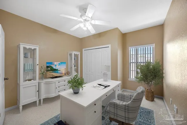 a spacious bedroom with a balcony a bed and a window