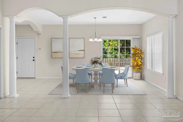 a kitchen with stainless steel appliances a refrigerator sink and cabinets