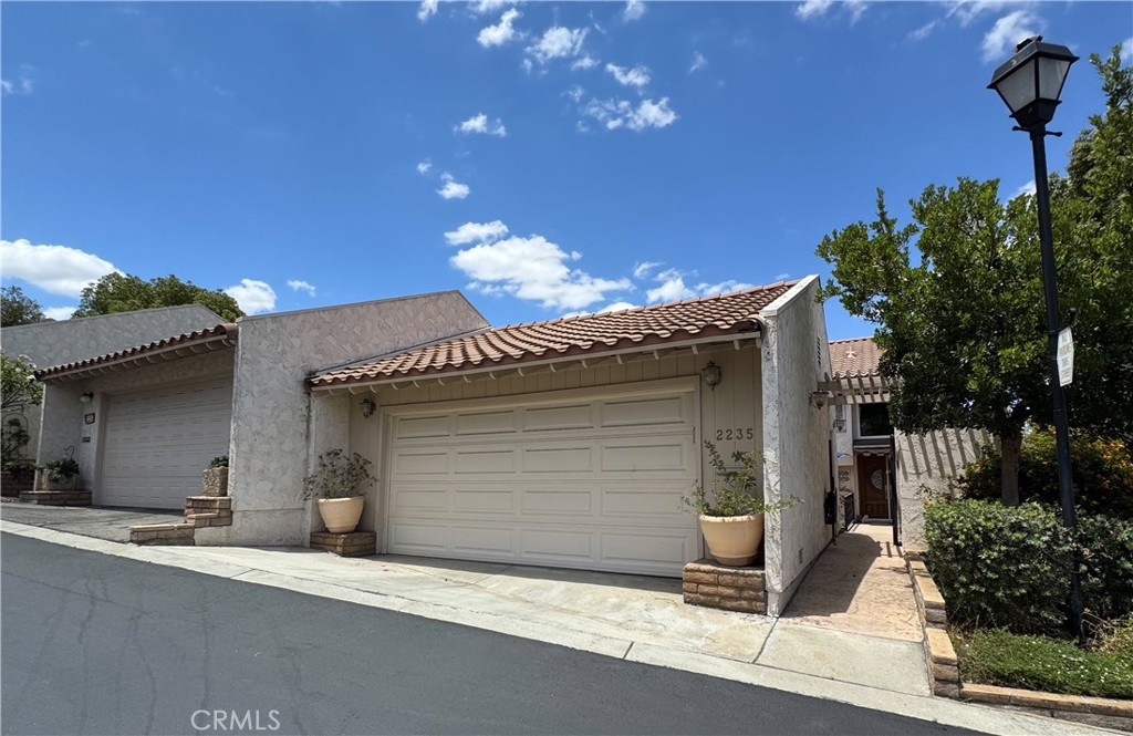 2235 El Capitan Drive Riverside, CA 92506 - Photo 2 of 5 Front view of entry and 2 car garage