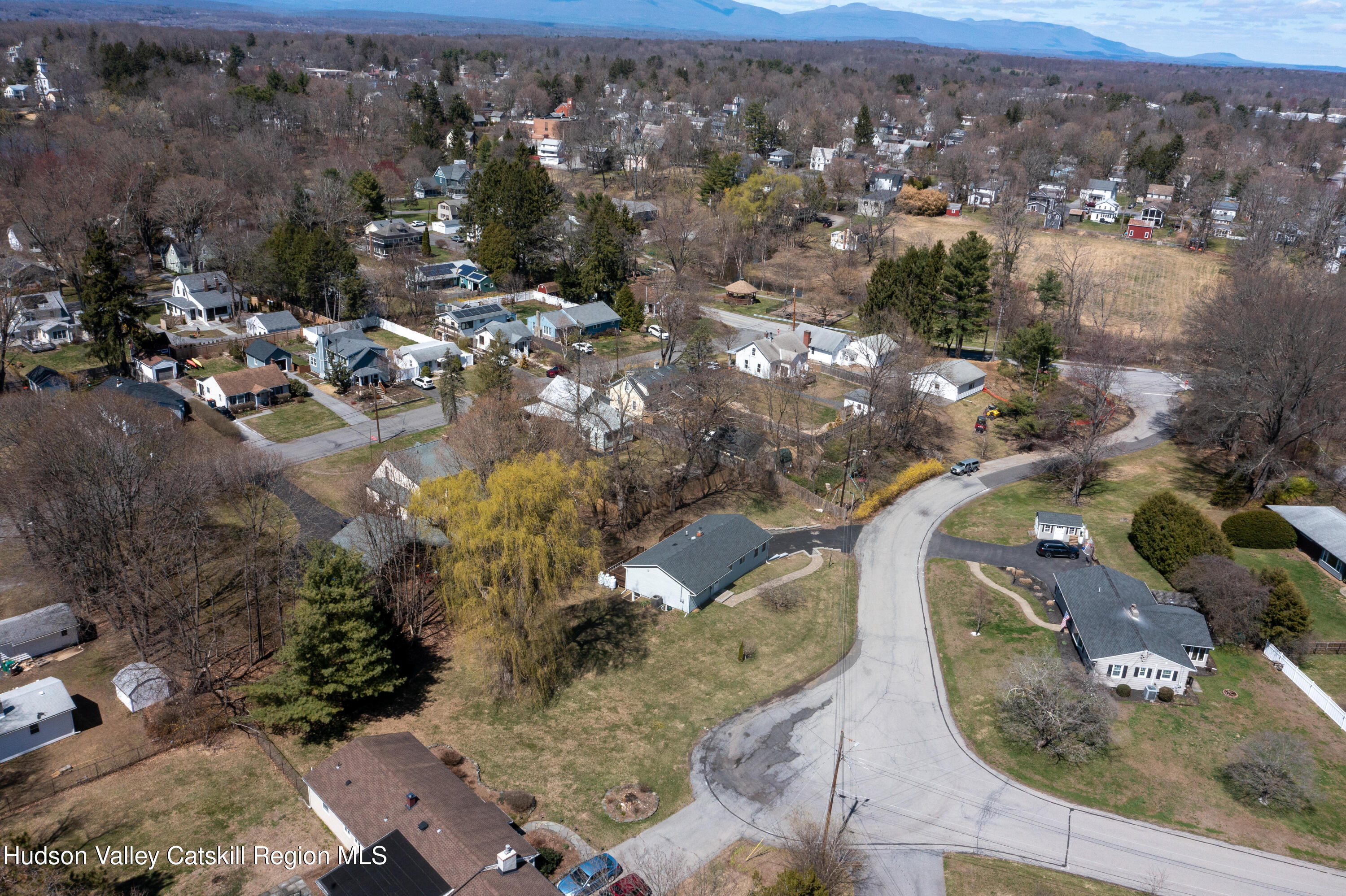 16 Trinity Place Rhinebeck, NY 12572 - Photo 24 of 42 an aerial view of a house with a yard and lake view