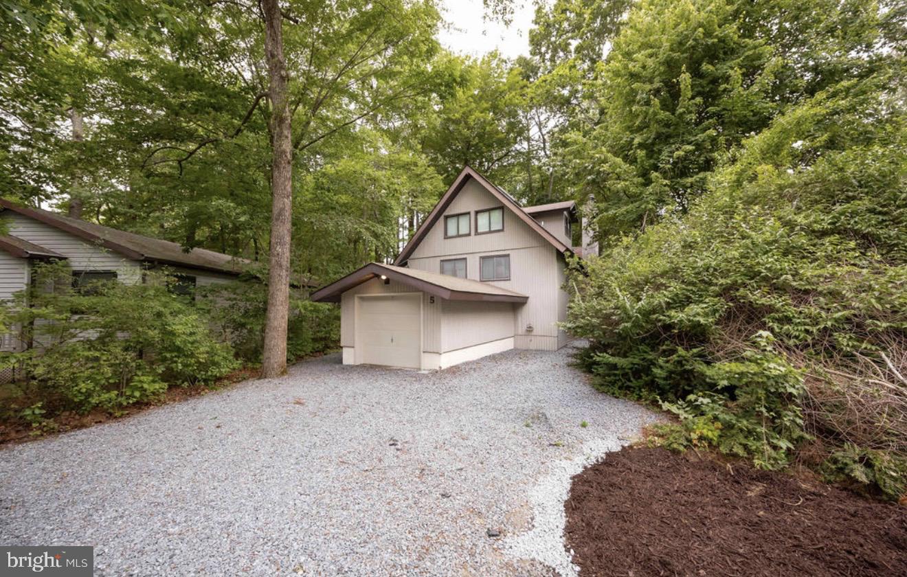 5 Falcon Bridge Road Ocean Pines, MD 21811 - Photo 2 of 59 a house view with a outdoor space