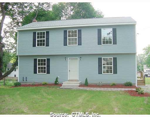 0 Graham Road Ashford, CT 06278 - Photo 1 of 1 a front view of a house with a garden