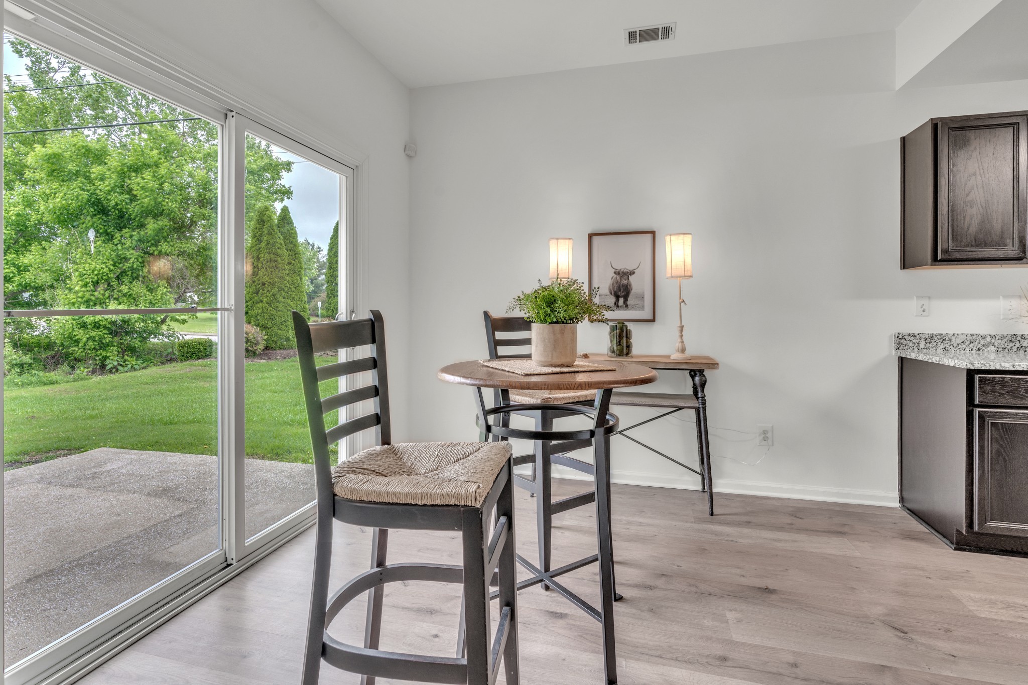 1000 Beverly Lane Spring Hill, TN 37174 - Photo 12 of 54 a view of a dining room with furniture window and wooden floor