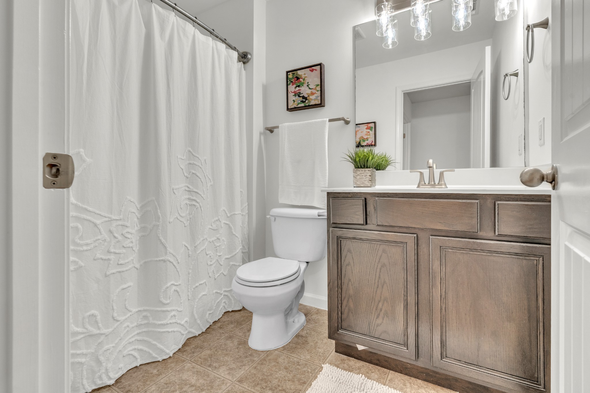 1000 Beverly Lane Spring Hill, TN 37174 - Photo 23 of 54 a bathroom with a sink toilet and shower
