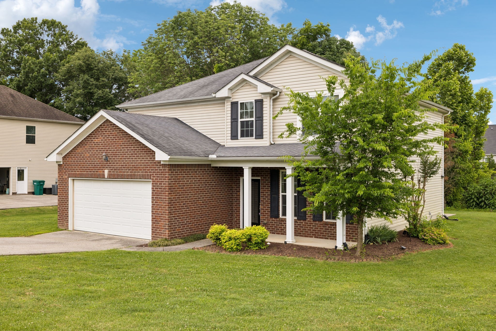 1000 Beverly Lane Spring Hill, TN 37174 - Photo 43 of 54 a front view of house with yard and green space