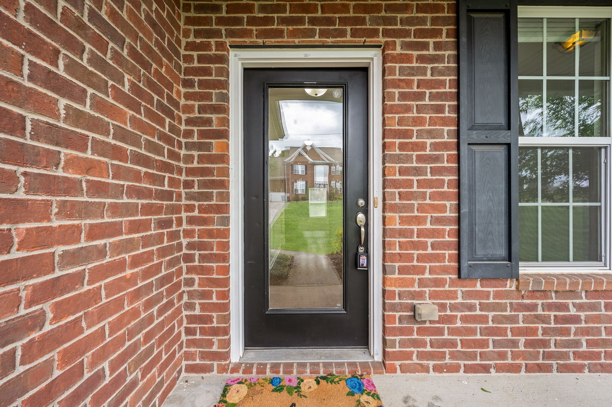 1000 Beverly Lane Spring Hill, TN 37174 - Photo 7 of 54 a view of a brick house with a door
