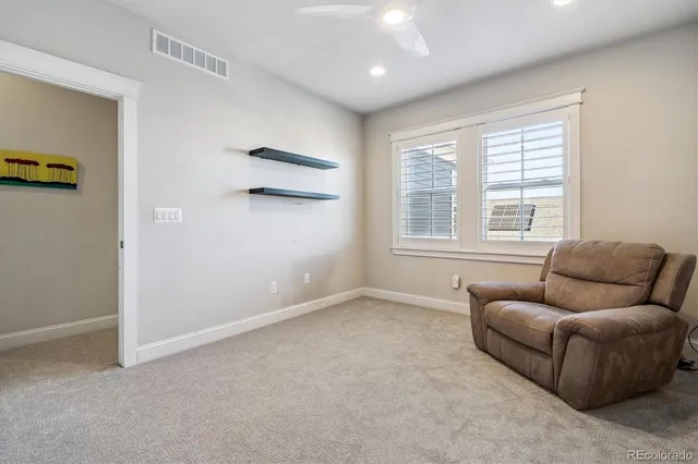 a bathroom with a sink toilet vanity and tub