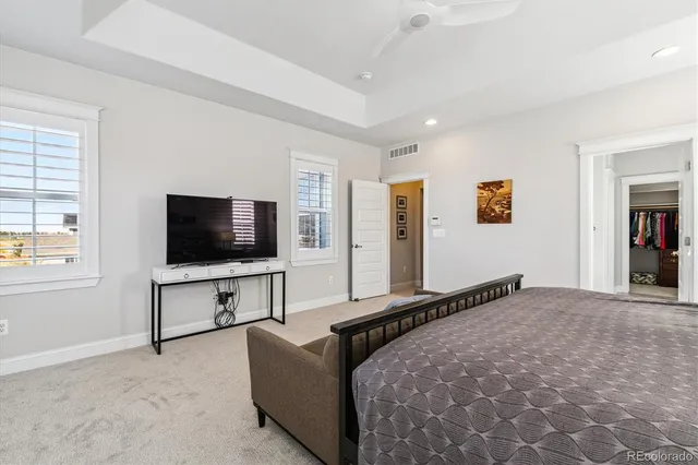 a en suite bathroom with a tub sink and shower