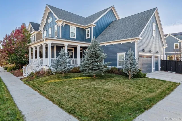 a view of entryway with wooden floor and stairs