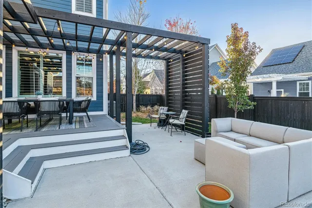 a lobby with furniture and floor to ceiling window