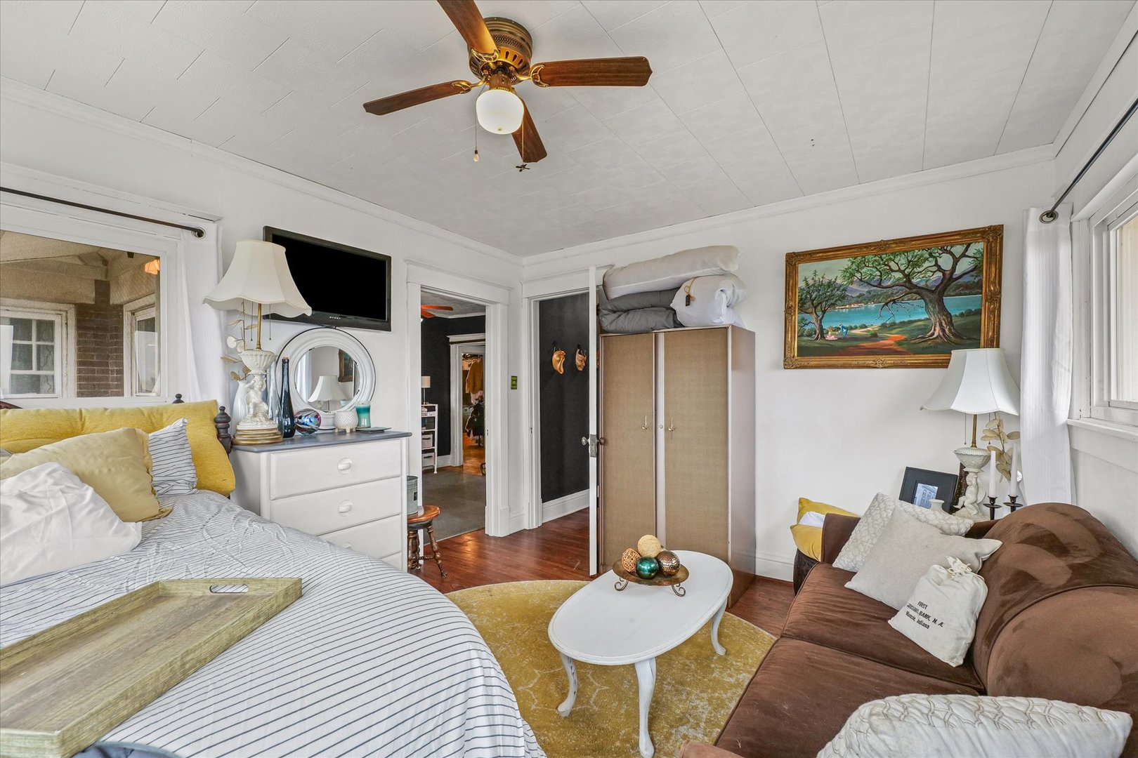 37857 East 100 North Road Bellflower, IL 61724 - Photo 24 of 43 a living room with furniture and a flat screen tv
