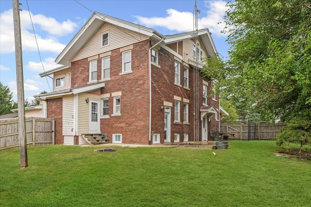 a view of a big yard with a house